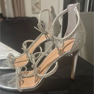 Silver heels size 10. Worn one time.